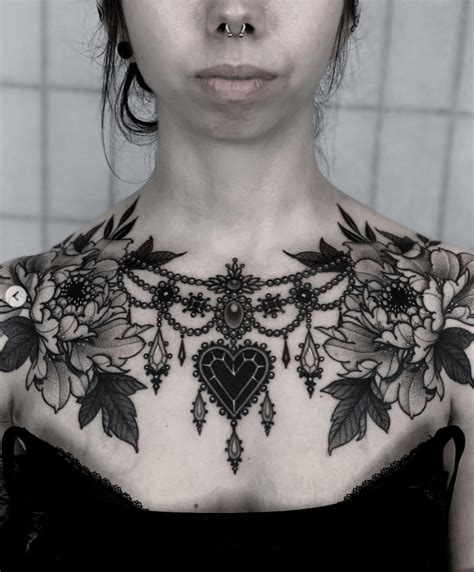 small upper chest tattoo female|Bold and Beautiful: 50+ Chest Tattoos for Women。